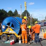 commercial sewer cleaning service using hot water jetter